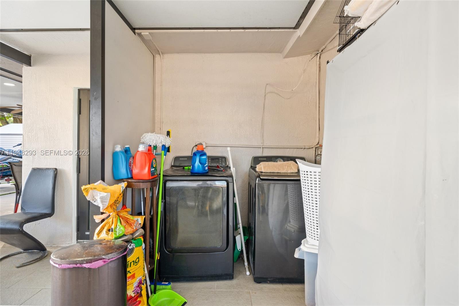 7874 Northwest 175th Street Hialeah, FL 33015 - Photo 19 of 19 a utility room with dryer and washer