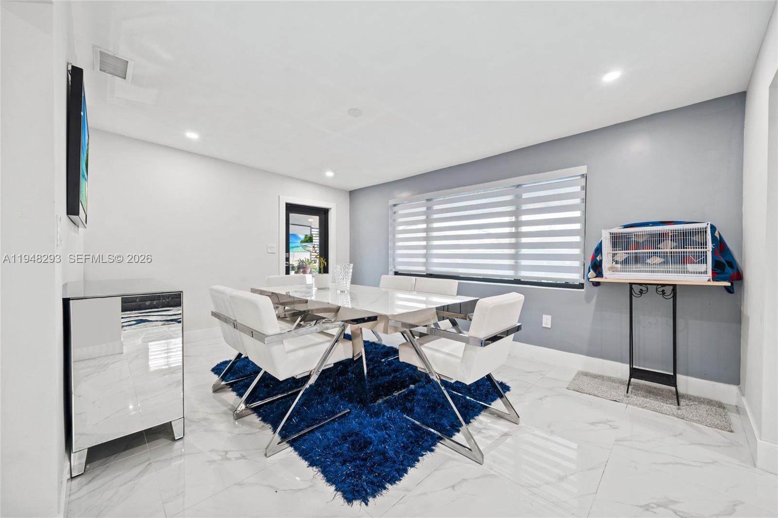 7874 Northwest 175th Street Hialeah, FL 33015 - Photo 7 of 19 a workspace with furniture and window