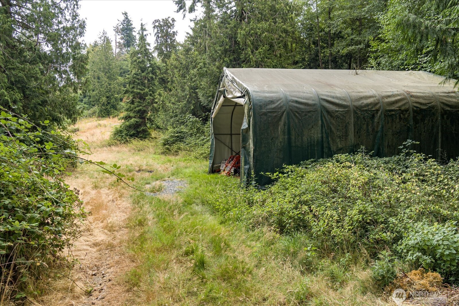 8175 Mossy Rock Road Clinton, WA 98236 - Photo 3 of 27 a view of small garden