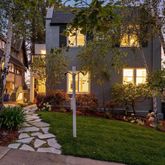 a view of a yard in front of the house