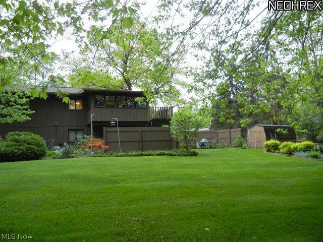 4210 Slaughter Road Uniontown, OH 44685 - Photo 6 of 25 Backyard view showing shed.