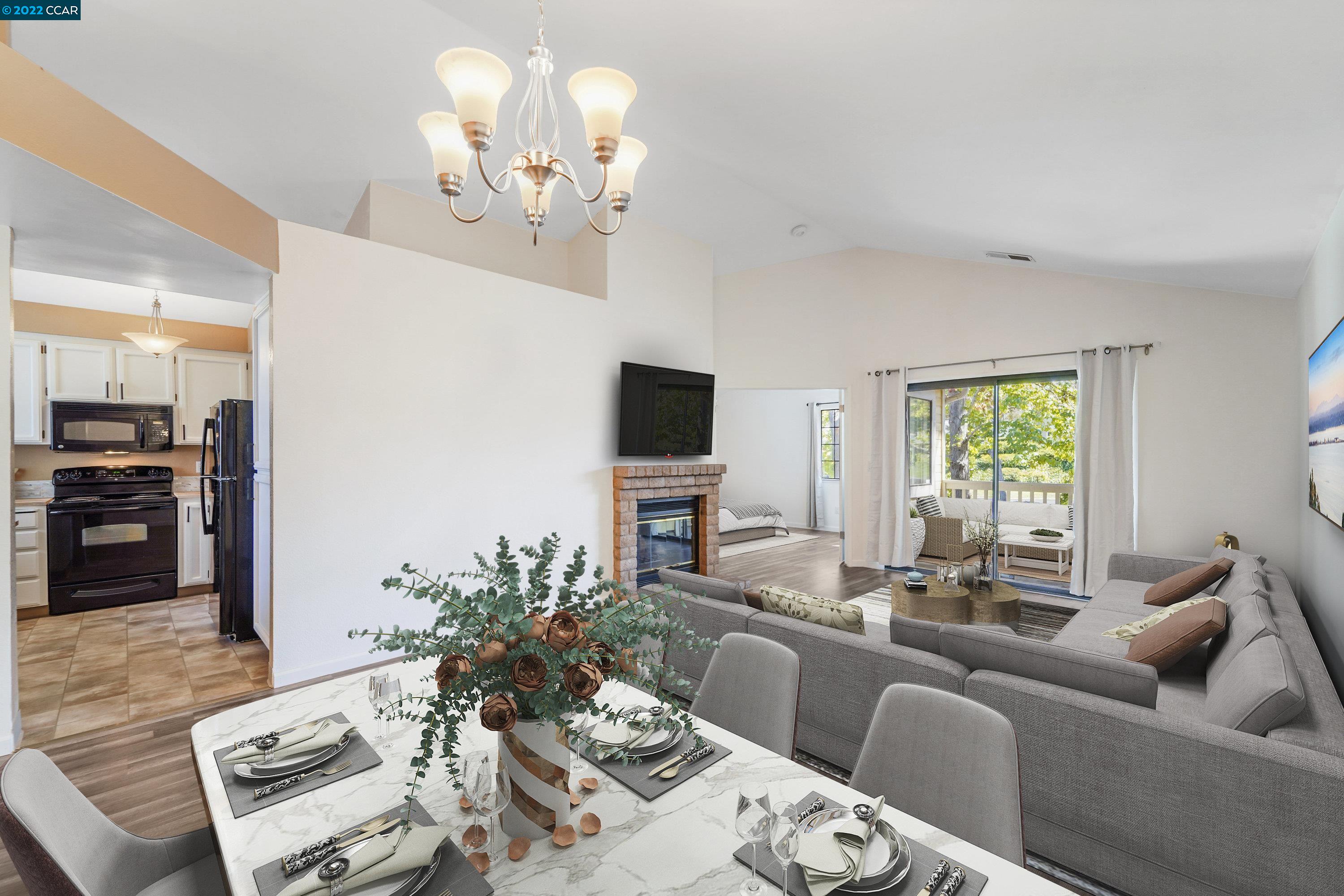 206 Devonwood Hercules, CA 94547 - Photo 1 of 1 a living room with furniture a large window and a flat screen tv