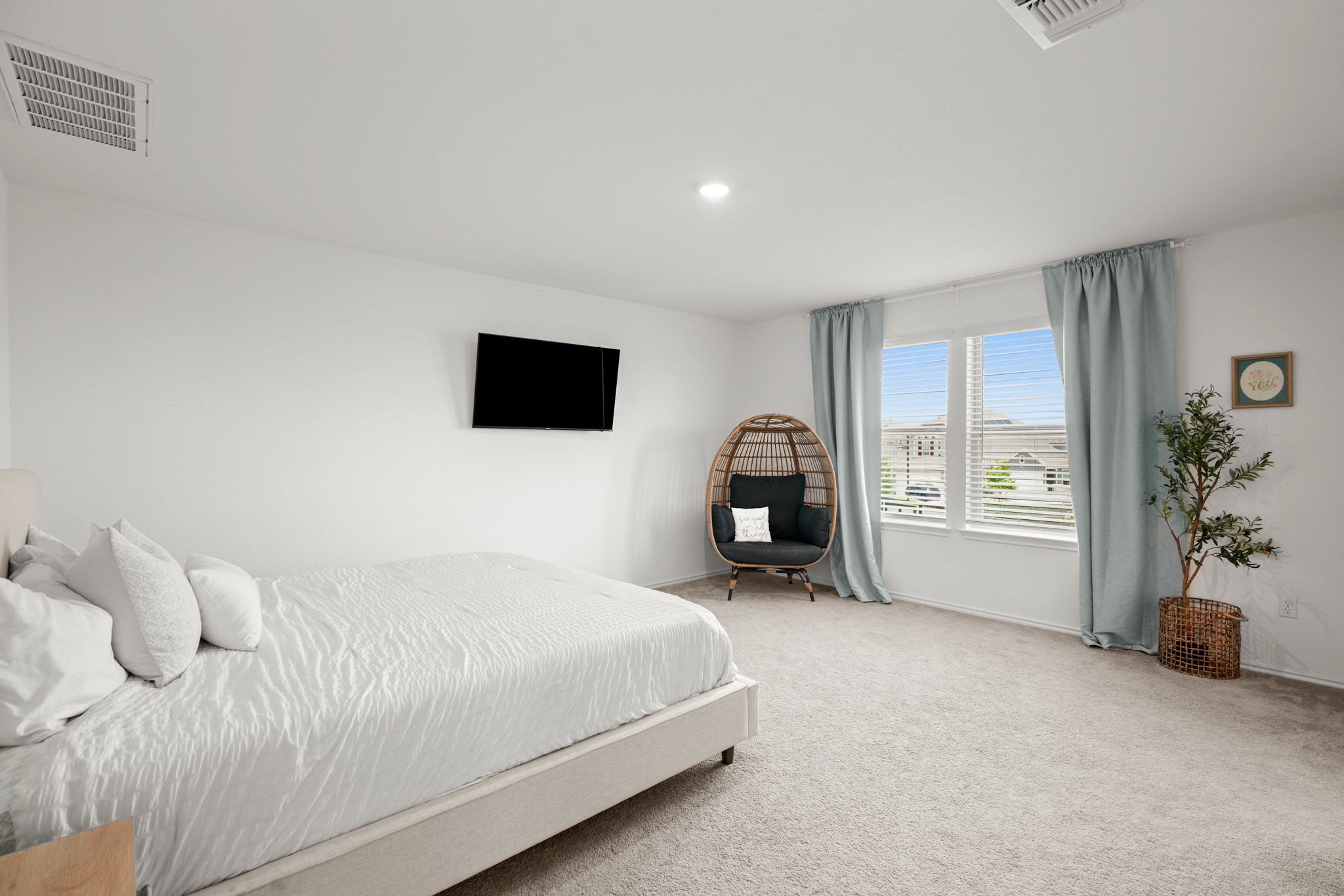 500 Pickrell Loop Georgetown, TX 78628 - Photo 14 of 29 a bedroom with a bed and a television