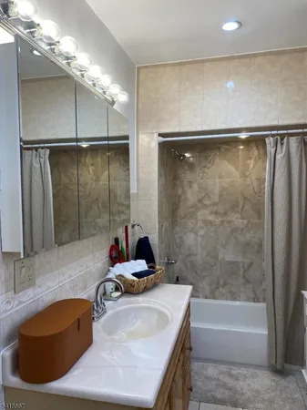 a bathroom with a sink and a bathtub