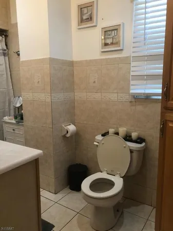 a bathroom with a toilet and a sink
