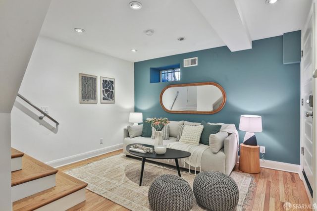 a very nice looking dining room with a table and chairs