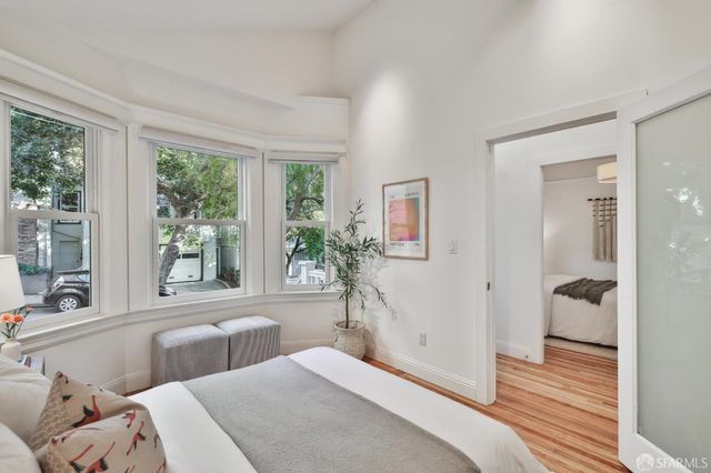 a view of a house with a small yard