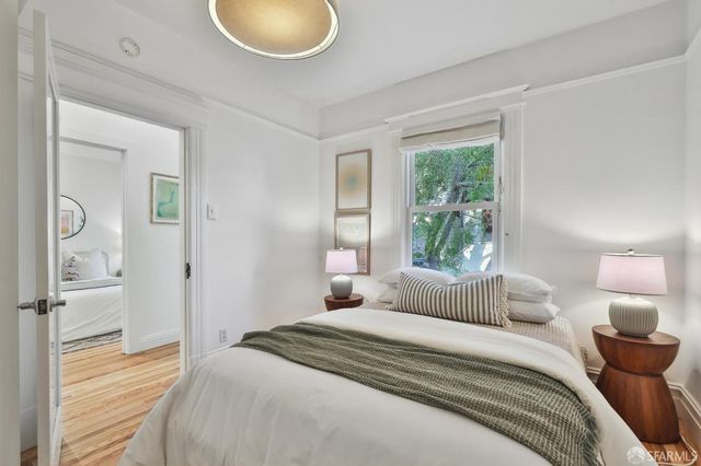 a view of a chairs setting in the backyard of a house