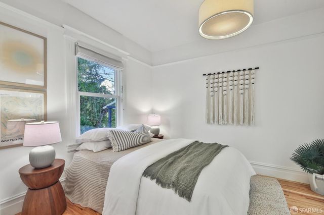 a view of entryway with a front door and wooden door