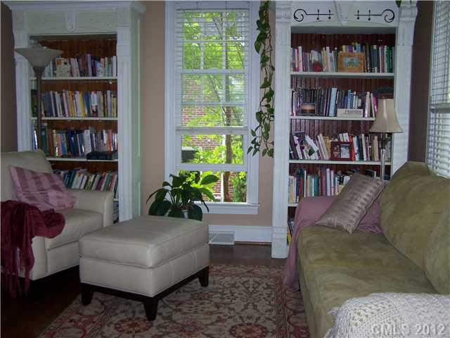 112 Morrison Hill Road Davidson, NC 28036 - Photo 4 of 13 a living room with furniture and a book shelf