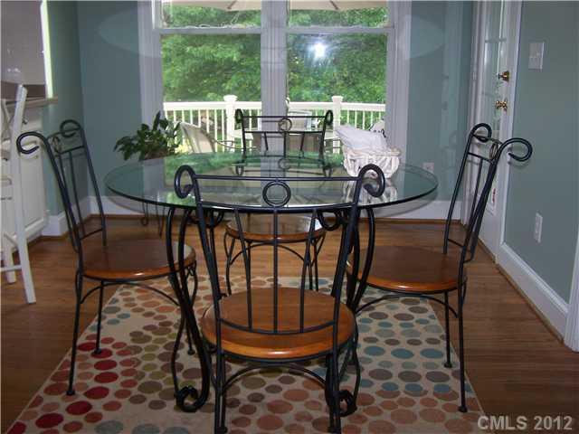 112 Morrison Hill Road Davidson, NC 28036 - Photo 6 of 13 a view of a dining room with furniture window and outside view
