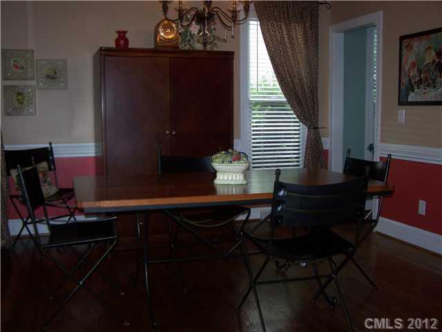 112 Morrison Hill Road Davidson, NC 28036 - Photo 8 of 13 a room with furniture and wooden floor