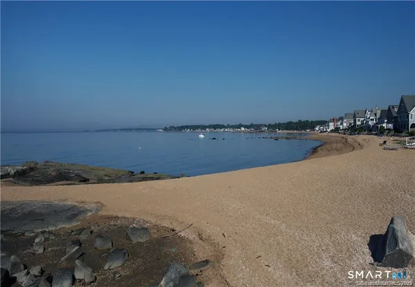 a view of a ocean with a nearby beach