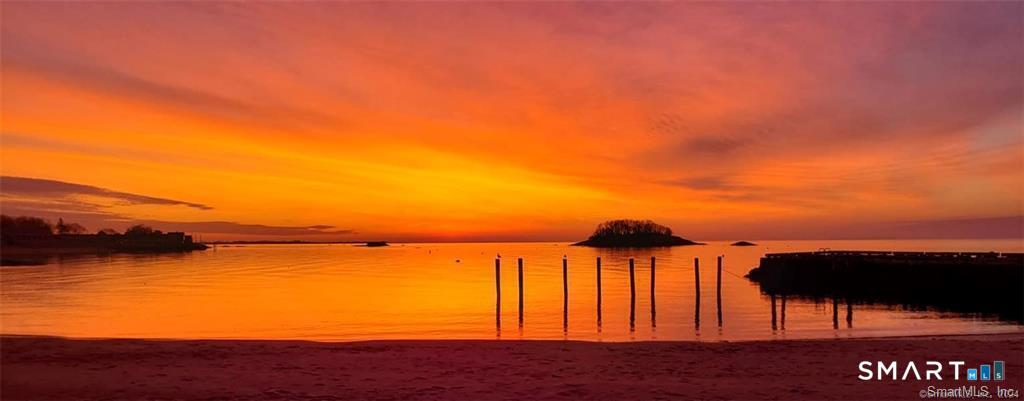 12 Flower Avenue Madison, CT 06443 - Photo 17 of 24 a view of a ocean with a nearby beach