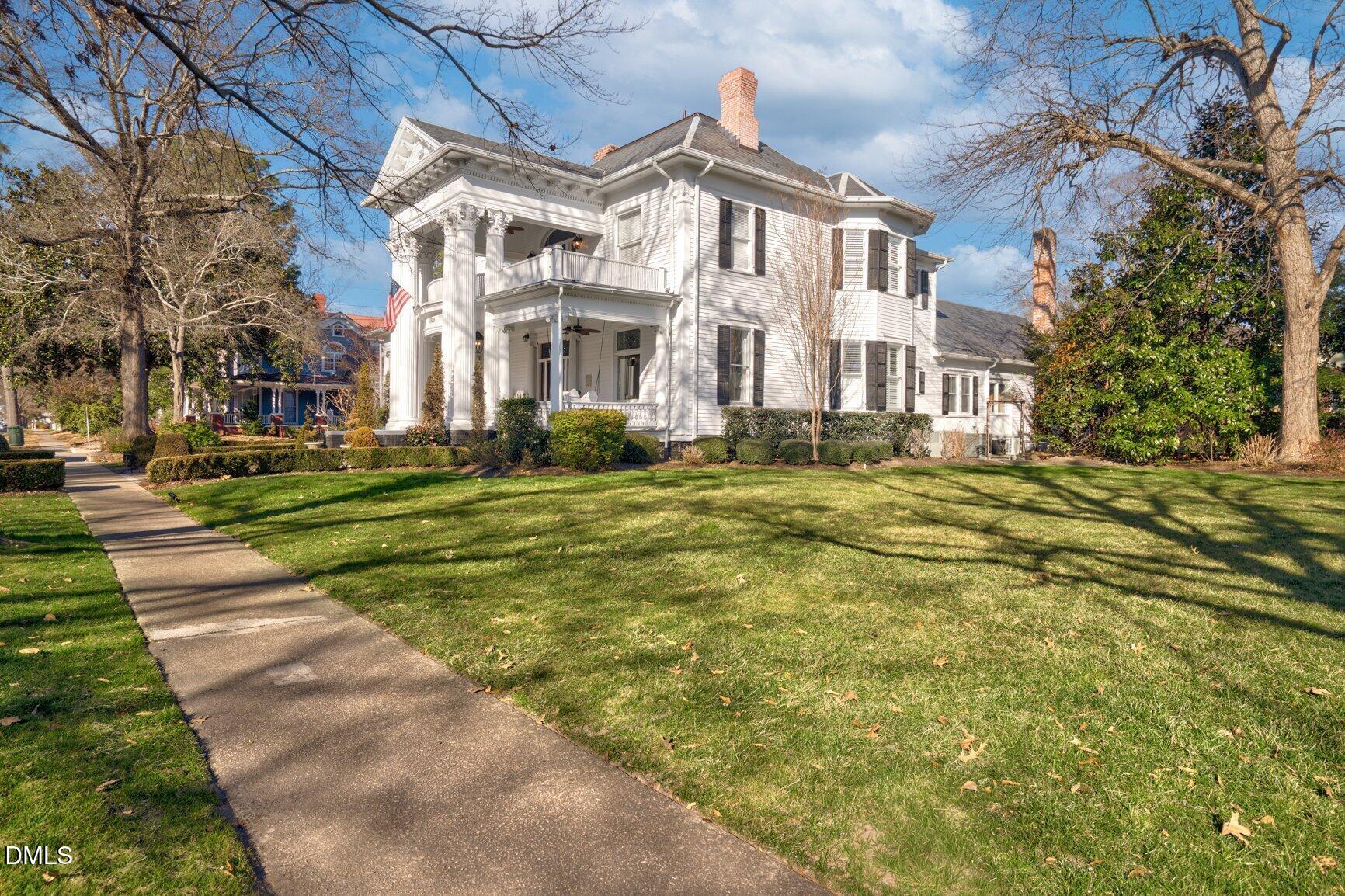 1109 North Main Street Tarboro, NC 27886 - Photo 8 of 90 a view of a building with a yard