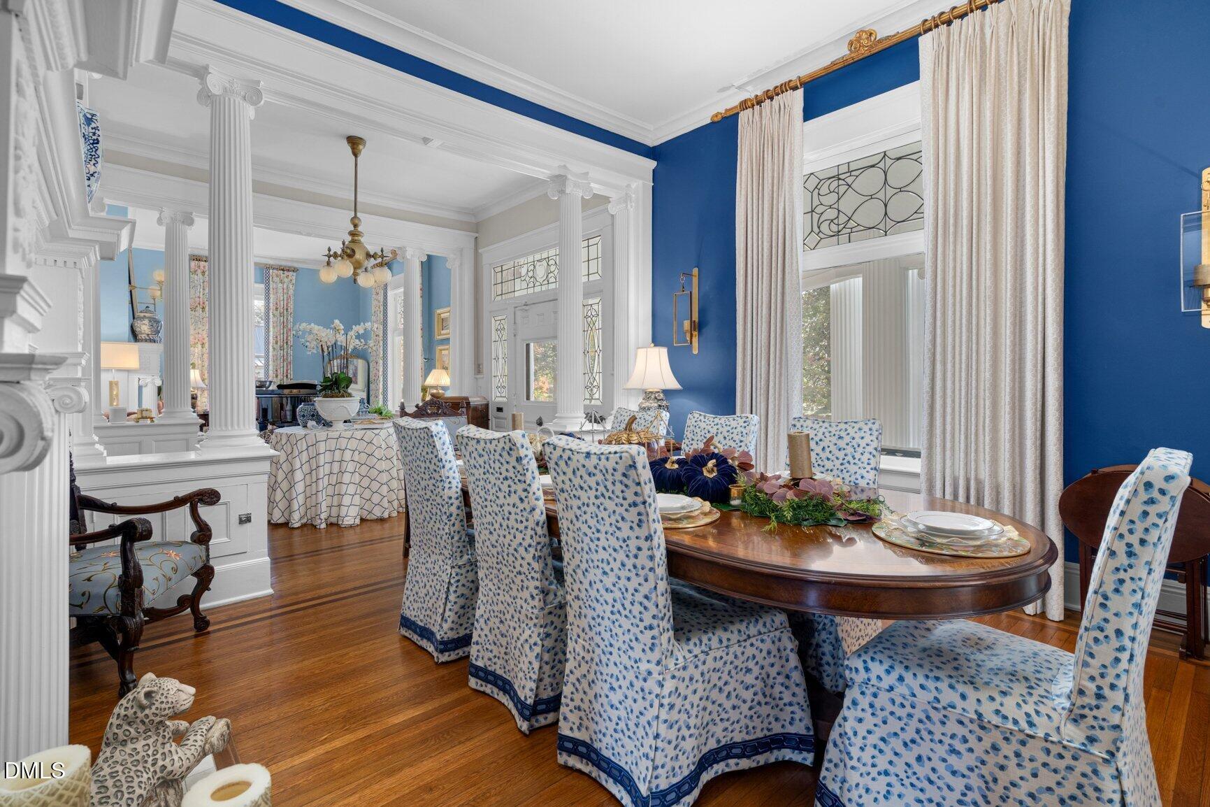 1109 North Main Street Tarboro, NC 27886 - Photo 13 of 90 a view of a dining room with furniture and wooden floor