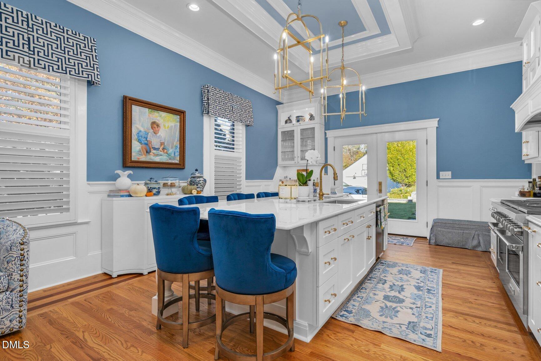 1109 North Main Street Tarboro, NC 27886 - Photo 21 of 90 a large kitchen with a table and chairs