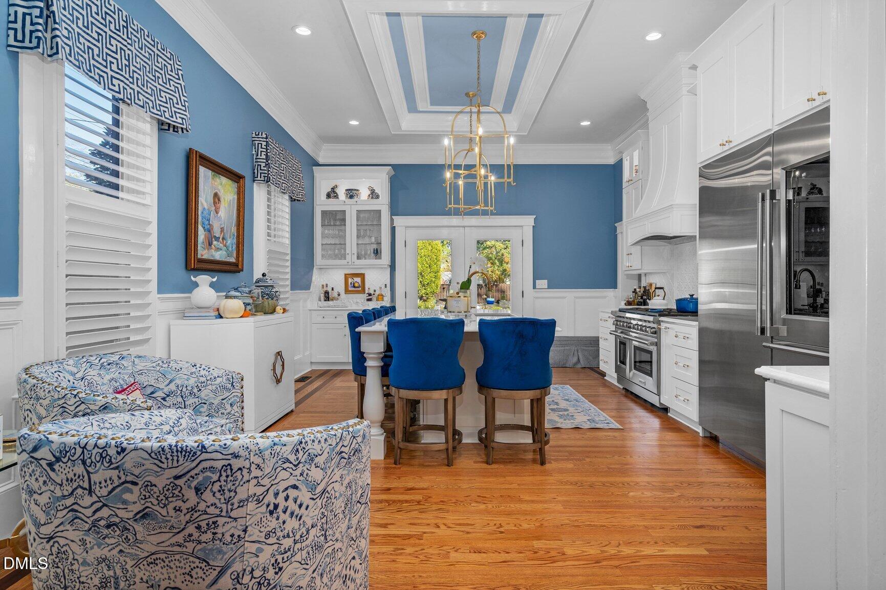 1109 North Main Street Tarboro, NC 27886 - Photo 25 of 90 a view of a dining room with furniture window and wooden floor
