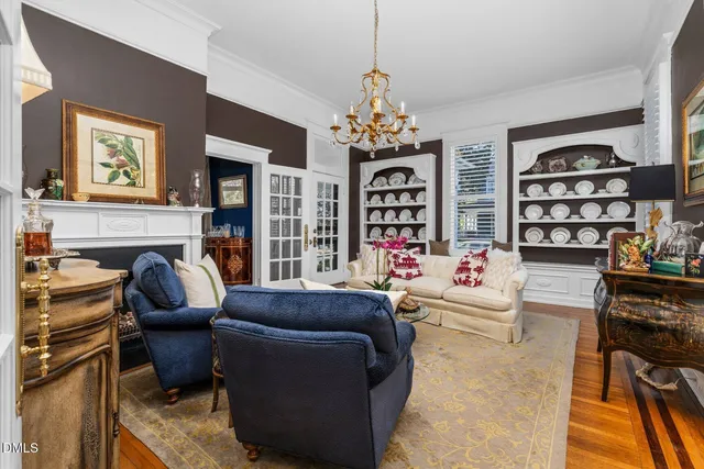 a bedroom with a bed and a fireplace