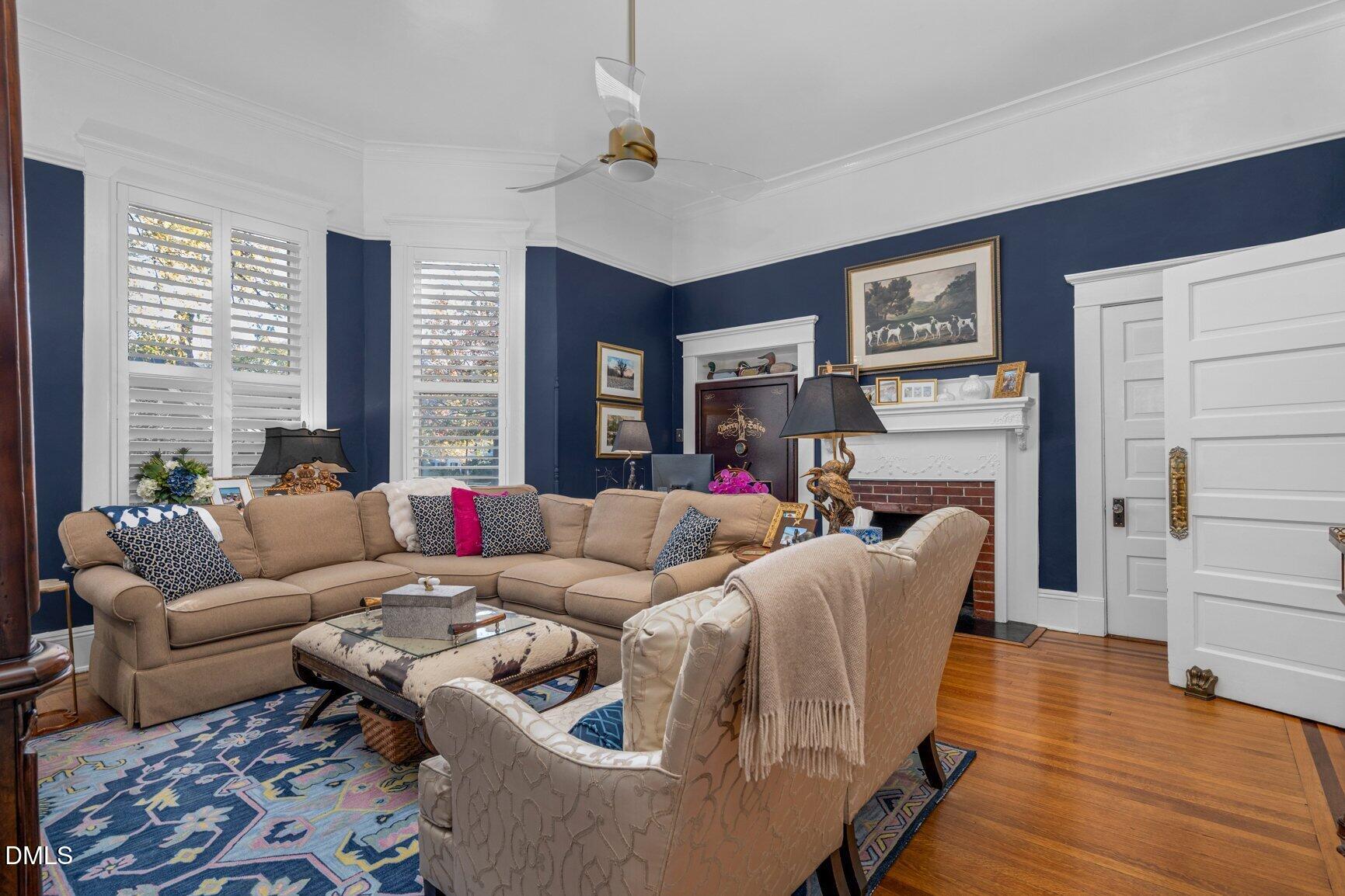 1109 North Main Street Tarboro, NC 27886 - Photo 35 of 90 a living room with furniture and a large window
