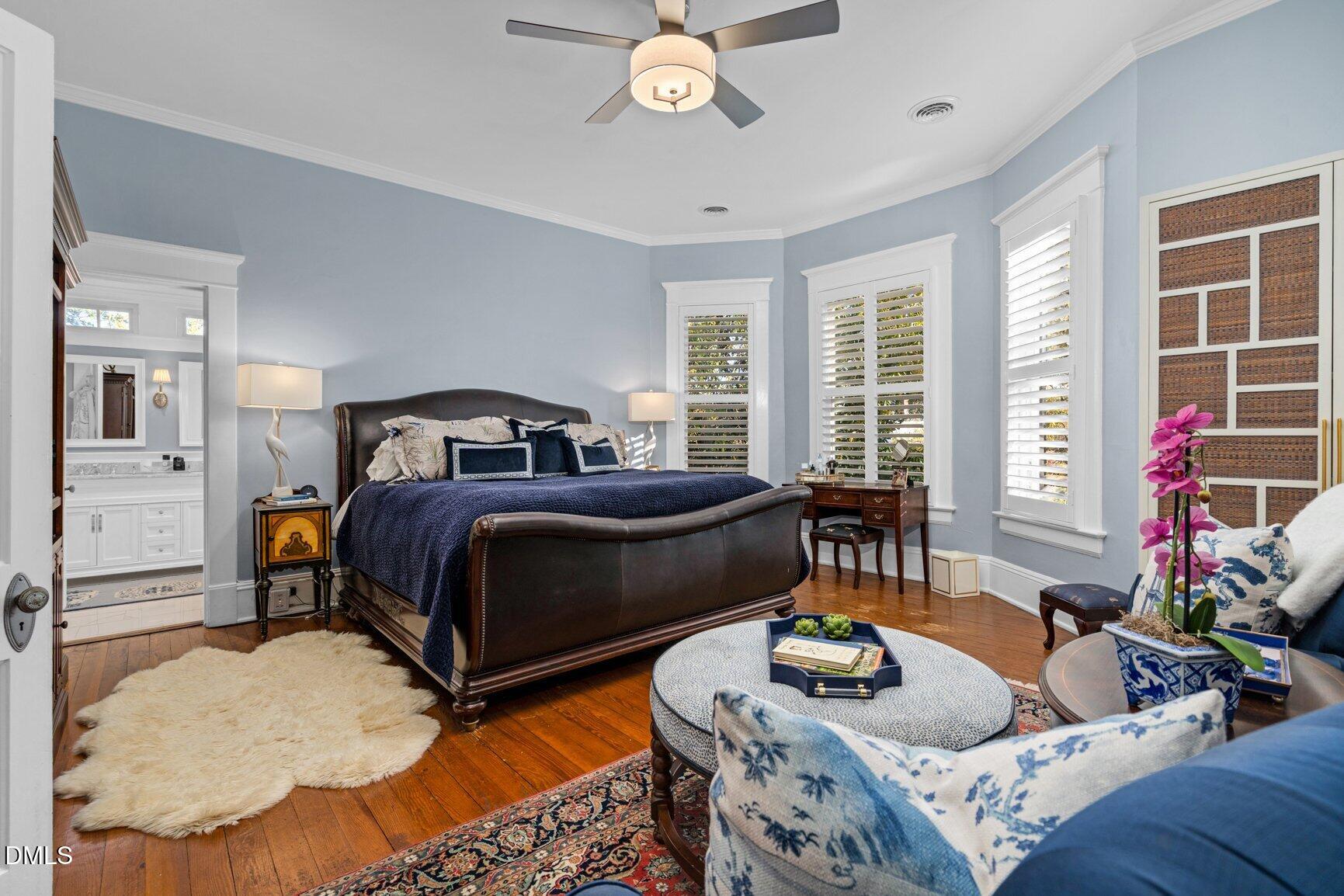 1109 North Main Street Tarboro, NC 27886 - Photo 63 of 90 a bedroom with furniture and a large window