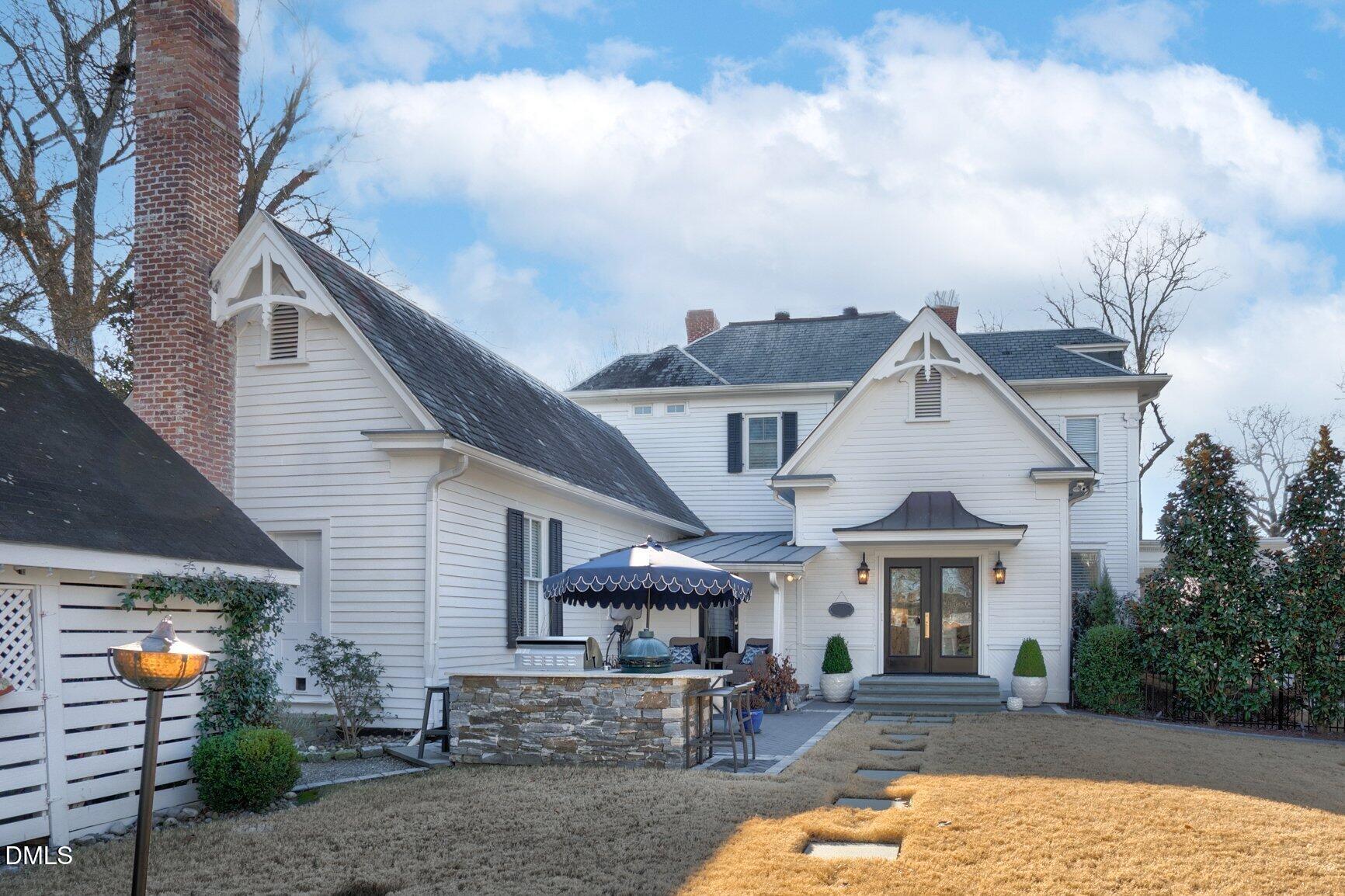 1109 North Main Street Tarboro, NC 27886 - Photo 72 of 90 a front view of a house with patio