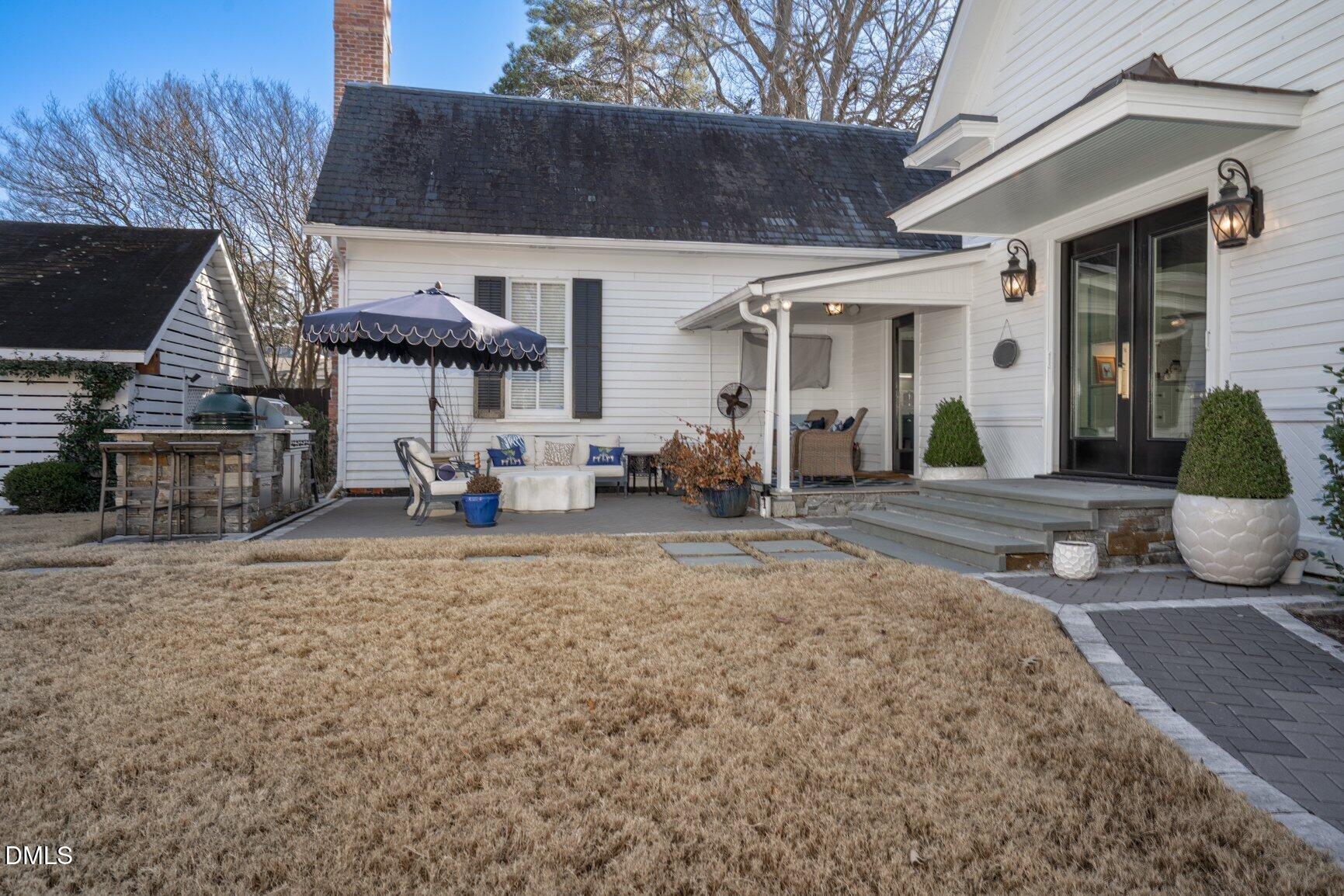 1109 North Main Street Tarboro, NC 27886 - Photo 73 of 90 a view of a house with backyard