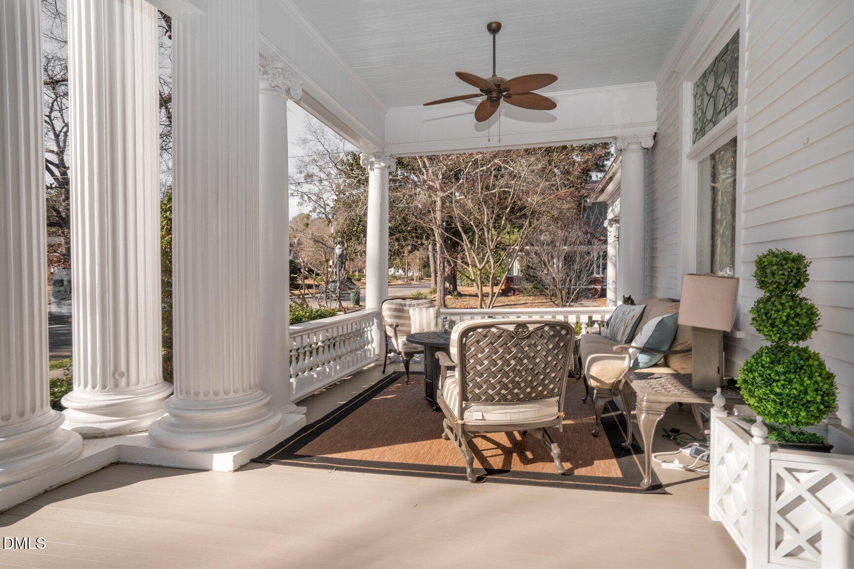 1109 North Main Street Tarboro, NC 27886 - Photo 5 of 90 a living room with furniture and a floor to ceiling window