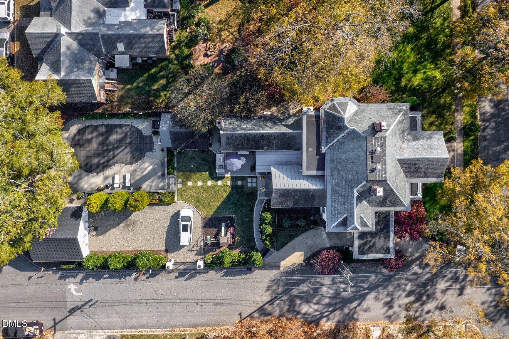 1109 North Main Street Tarboro, NC 27886 - Photo 86 of 90 an aerial view of a house with a garden and tree