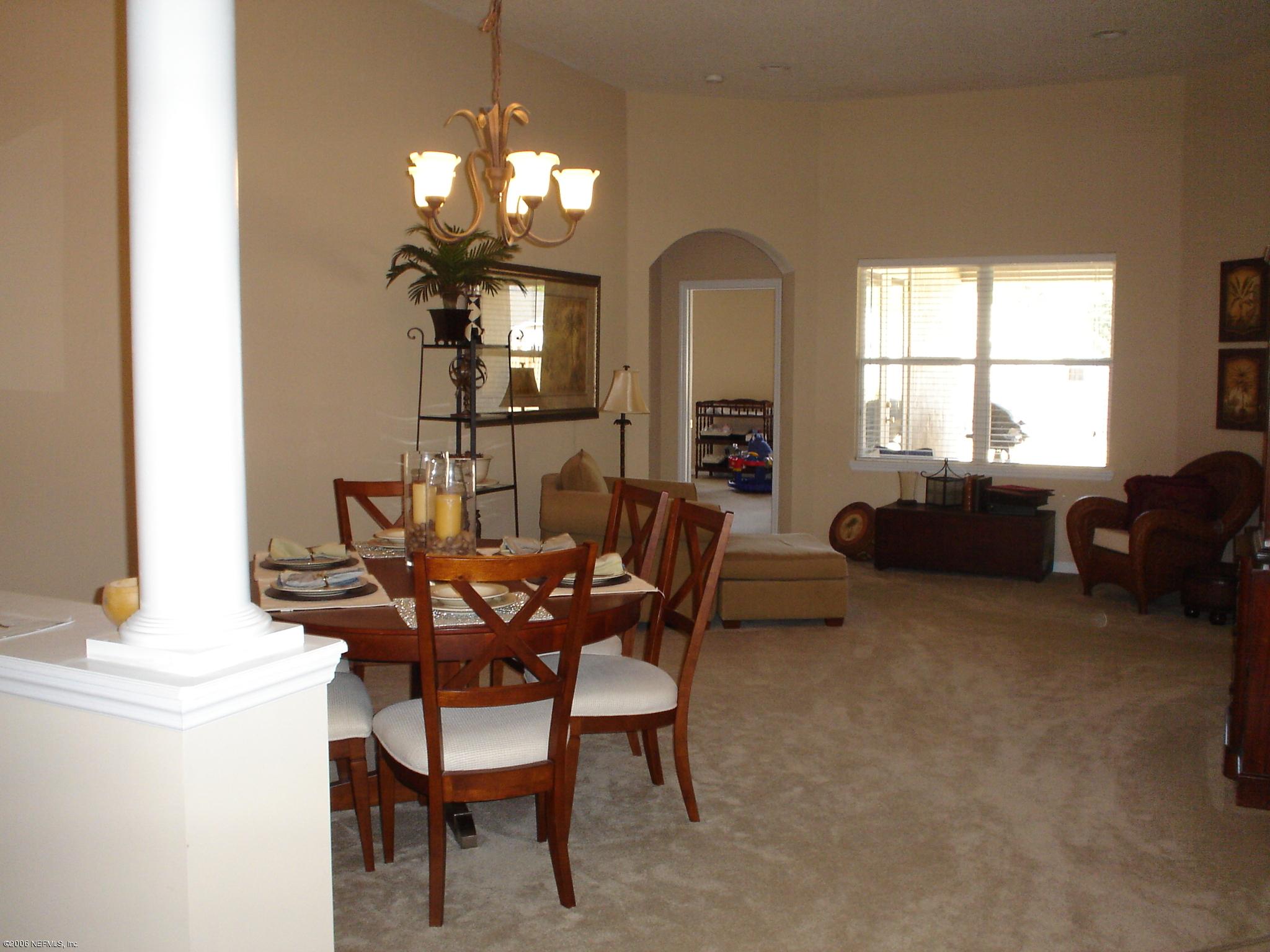 6477 Ginnie Springs Road Jacksonville, FL 32258 - Photo 3 of 5 Formal Dining Room and Living Room