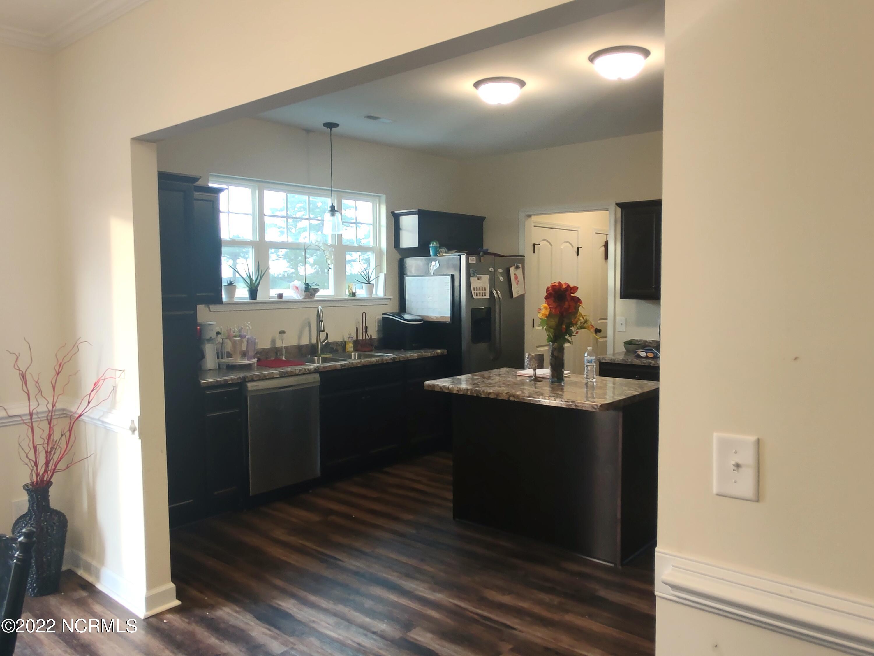802 Five Mile Road Richlands, NC 28574 - Photo 22 of 95 Dining room adjacent to kitchen