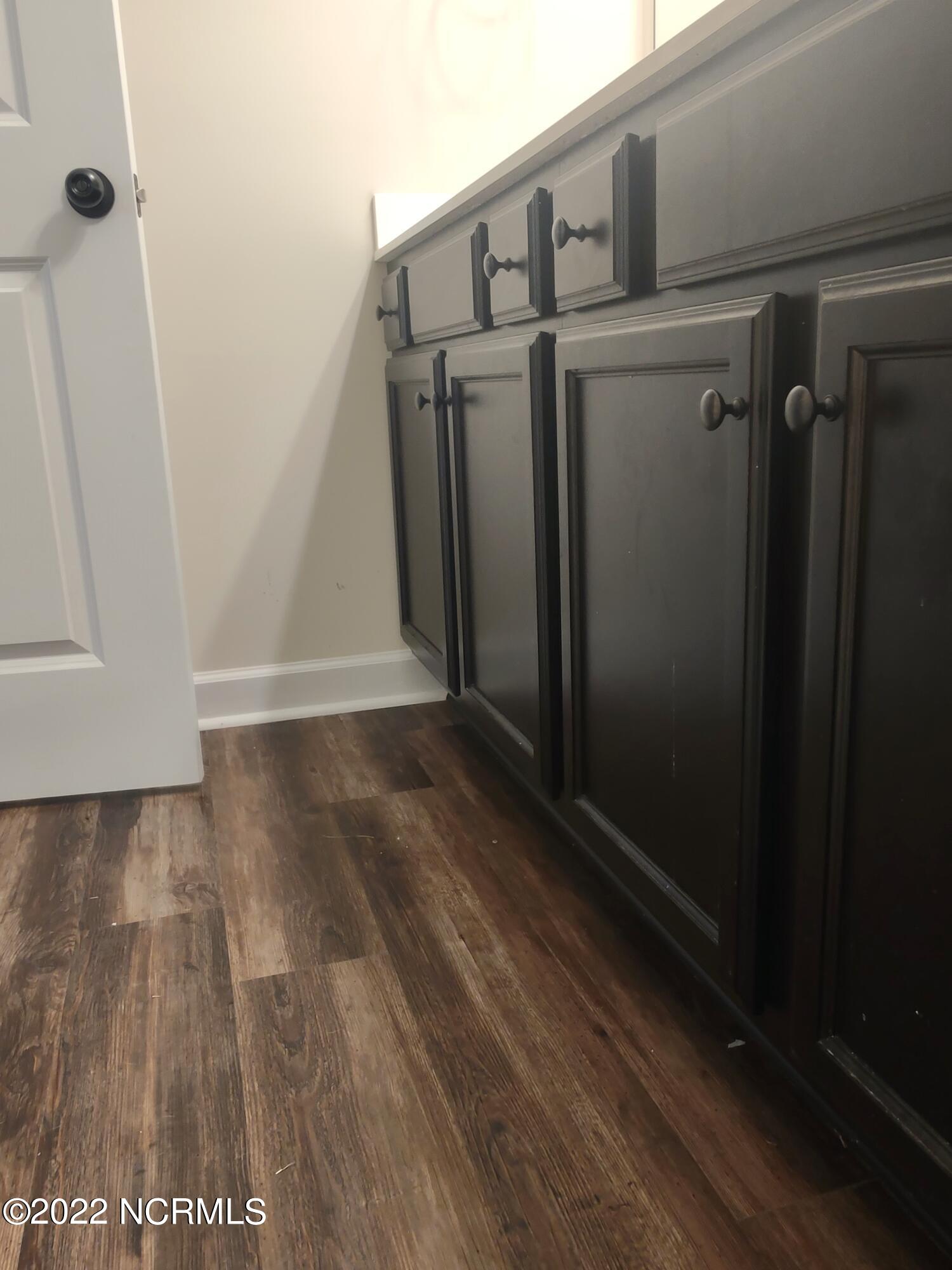 802 Five Mile Road Richlands, NC 28574 - Photo 78 of 95 Rich dark toned cabinets