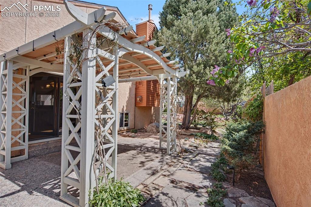 5301 Pinon Valley Road Colorado Springs, CO 80919 - Photo 24 of 27 a view of a house with patio