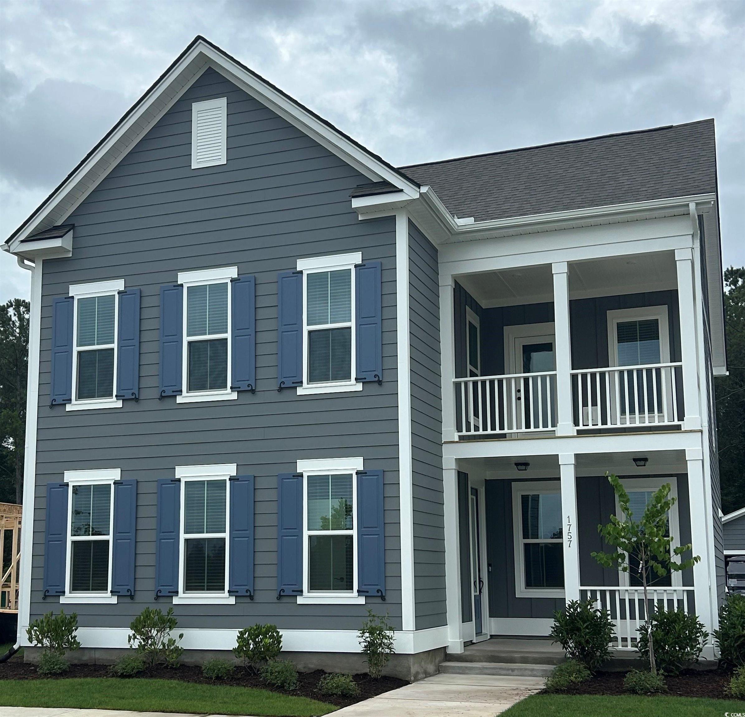 1757 Tryon Drive Myrtle Beach, SC 29588 - Photo 1 of 20 View of front of house featuring a balcony and cov