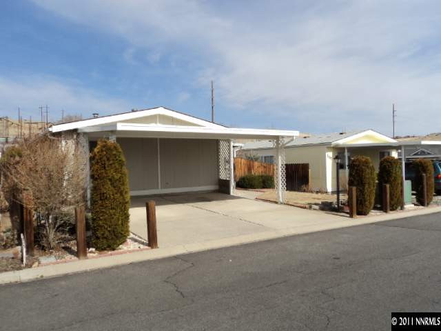 a front view of a house with parking