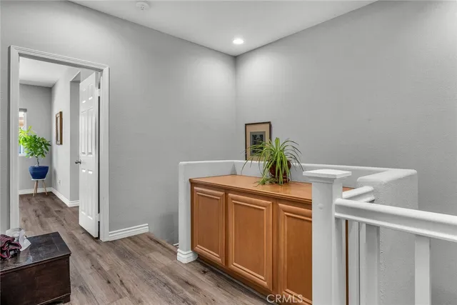 a bathroom with a sink a mirror and vanity