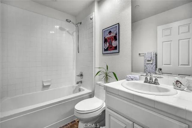 a bathroom with a sink and a bathtub