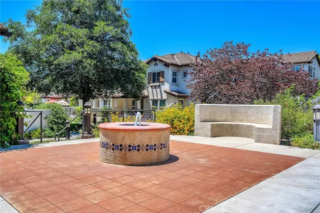 a view of fountain along with trees
