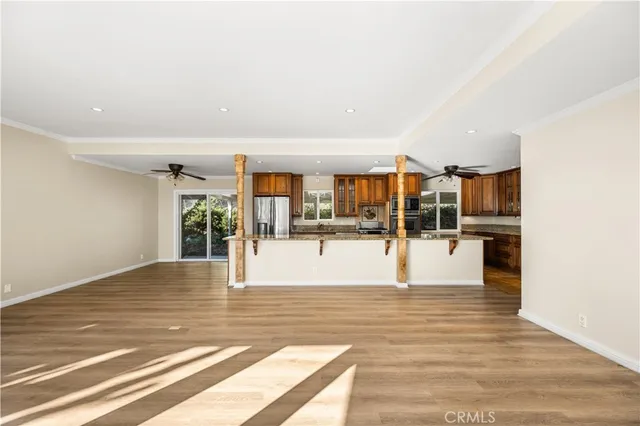 a view of a house with a yard and sitting area