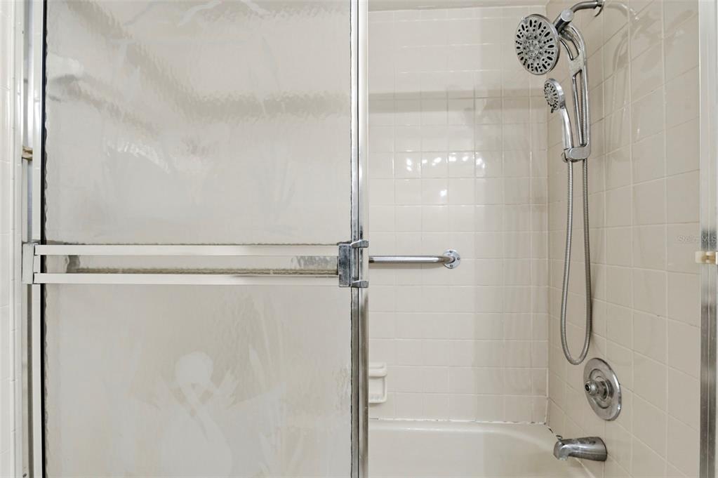 4101 Passport Lane, Unit 203 New Port Richey, FL 34653 - Photo 32 of 83 a bathroom with a shower and a sink