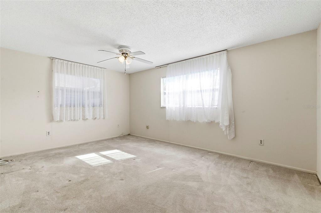 4101 Passport Lane, Unit 203 New Port Richey, FL 34653 - Photo 37 of 83 a view of an empty room with a window