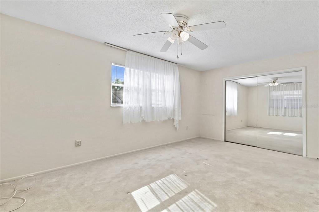 4101 Passport Lane, Unit 203 New Port Richey, FL 34653 - Photo 38 of 83 a view of an empty room with a window