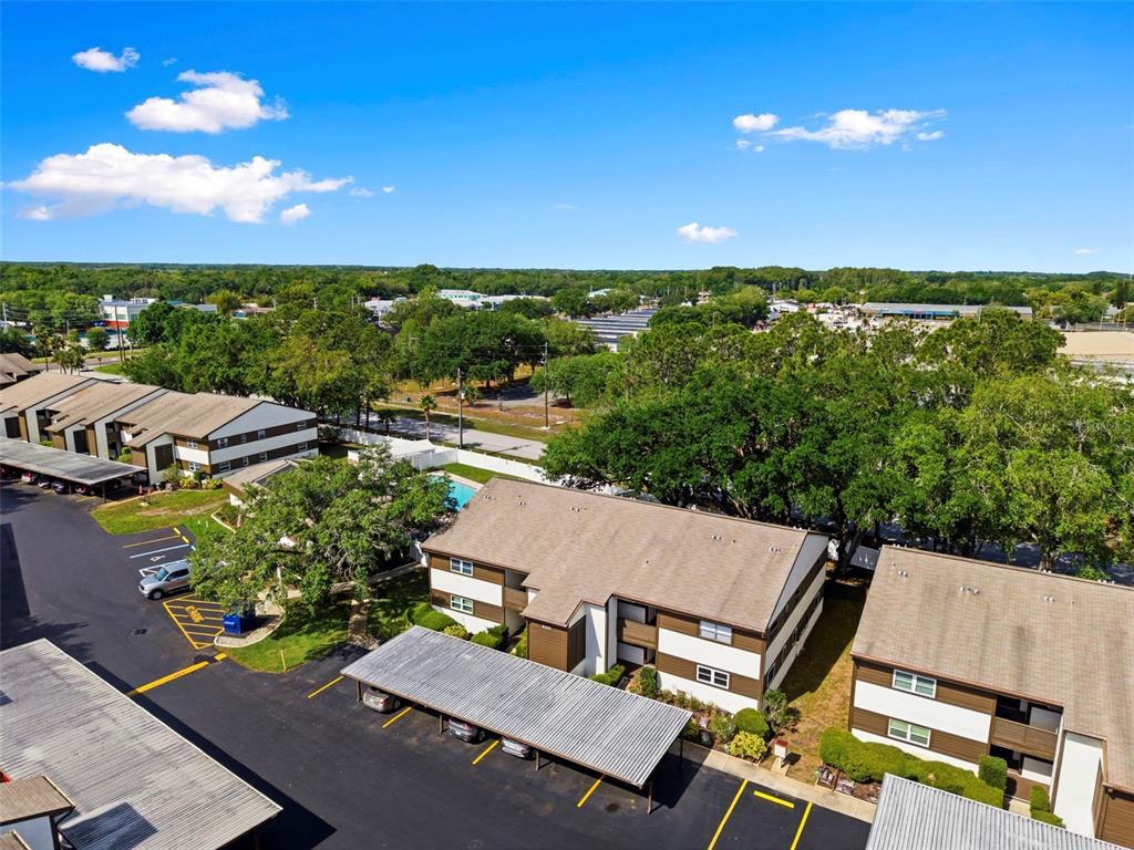 4101 Passport Lane, Unit 203 New Port Richey, FL 34653 - Photo 47 of 83 an aerial view of a house with a garden