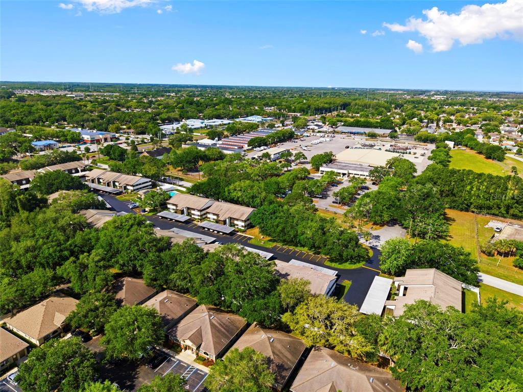 4101 Passport Lane, Unit 203 New Port Richey, FL 34653 - Photo 51 of 83 an aerial view of residential houses with outdoor space