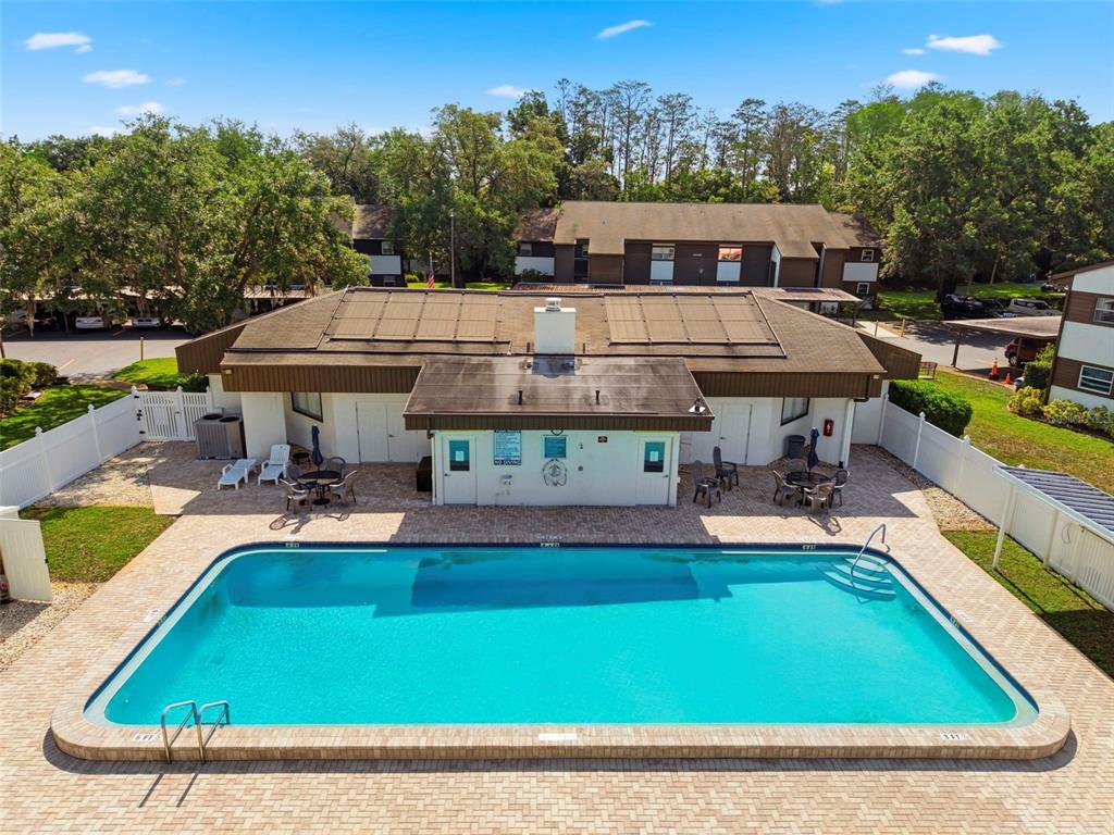4101 Passport Lane, Unit 203 New Port Richey, FL 34653 - Photo 57 of 83 swimming pool view with a seating space