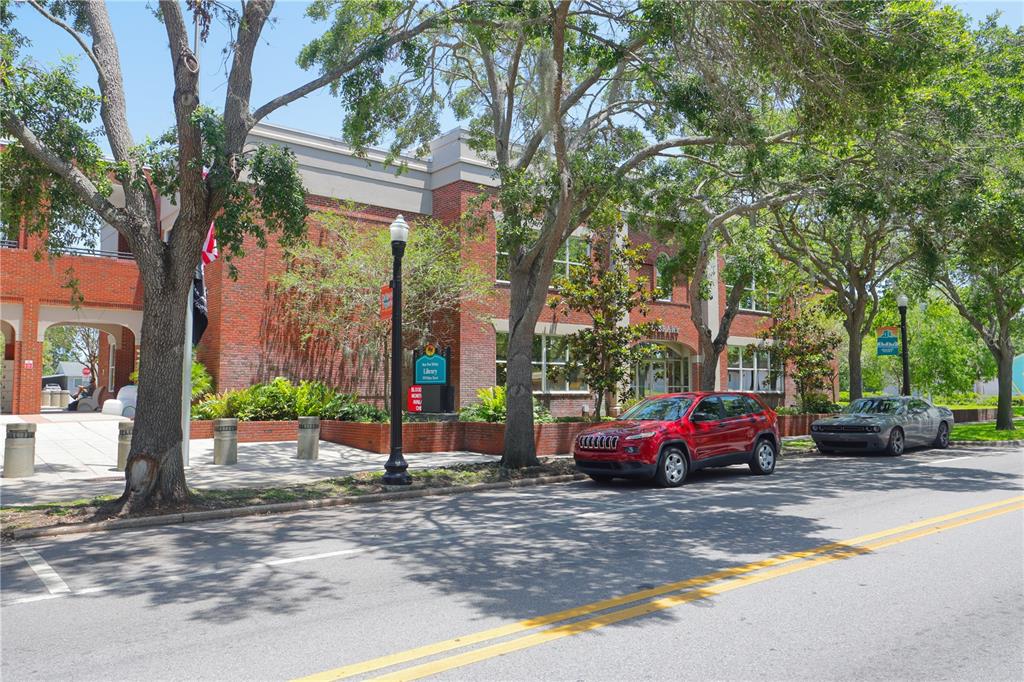4101 Passport Lane, Unit 203 New Port Richey, FL 34653 - Photo 77 of 83 a front view of a building with trees