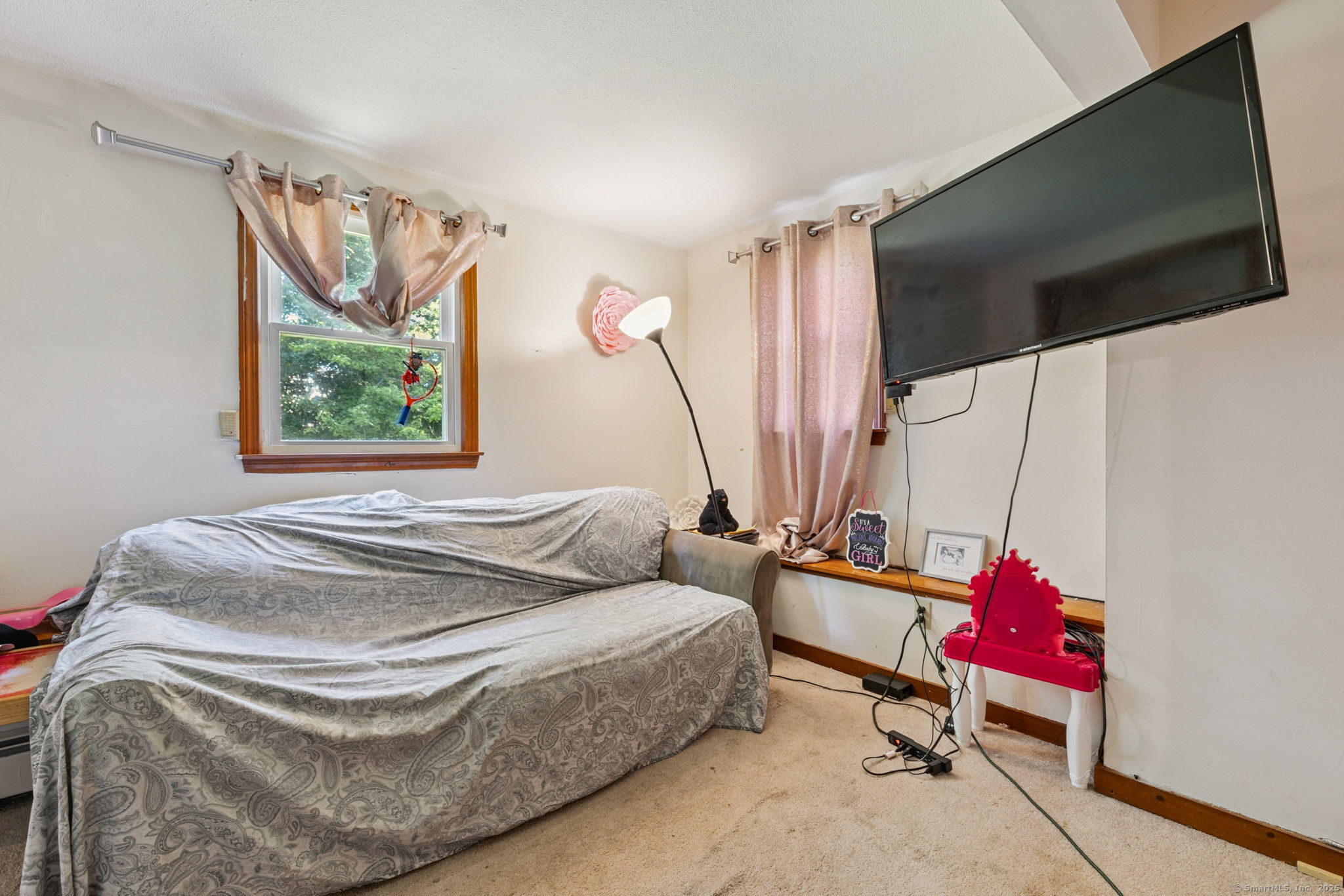 2 Sandra Drive Bloomfield, CT 06002 - Photo 25 of 32 a bedroom with a bed and a flat screen tv