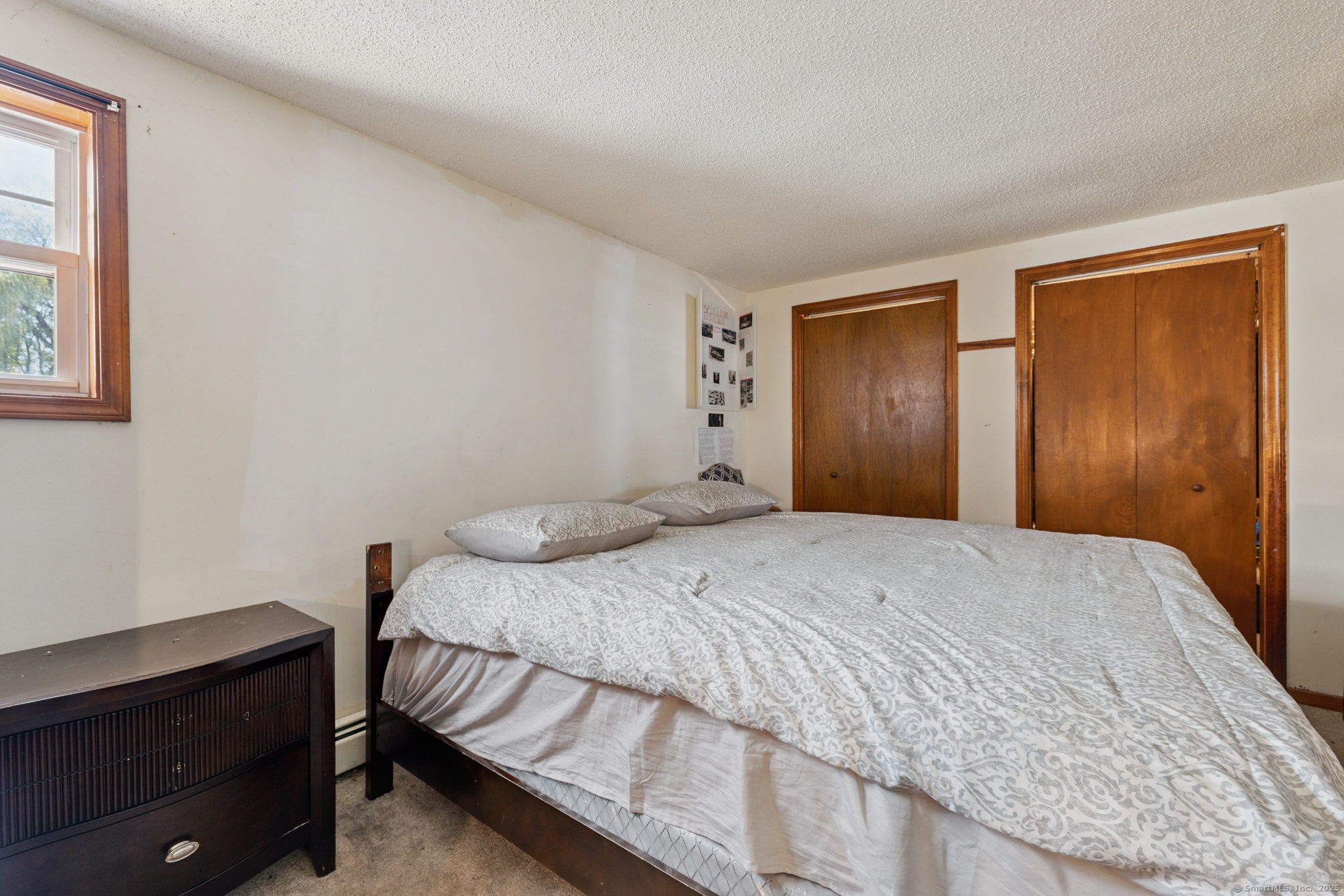 2 Sandra Drive Bloomfield, CT 06002 - Photo 26 of 32 a bedroom with a bed and a window