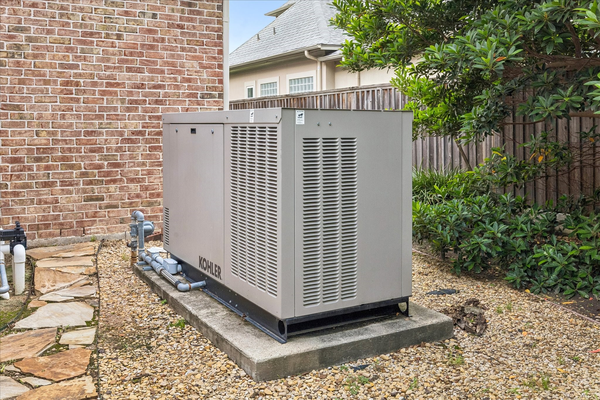 11421 Whippoorwill Road Houston, TX 77024 - Photo 30 of 33 Never be without power! This home features a premium Kohler generator. An essential luxury upgrade that provides automatic, reliable backup power for interior and exterior systems.