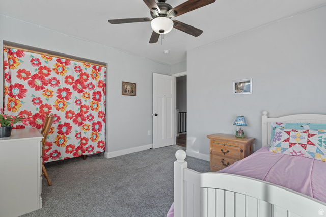 75 North 100th Street West Fillmore, UT 84631 - Photo 23 of 62 Carpeted bedroom featuring a ceiling fan and baseboards